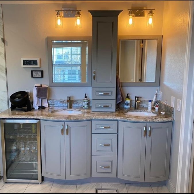 double vanity with center storage and beverage fridge